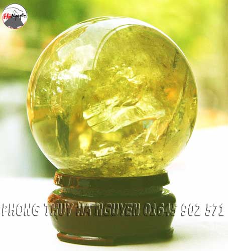 đá quý hà nguyễn- quả cầu phong thủy thạch anh vàng